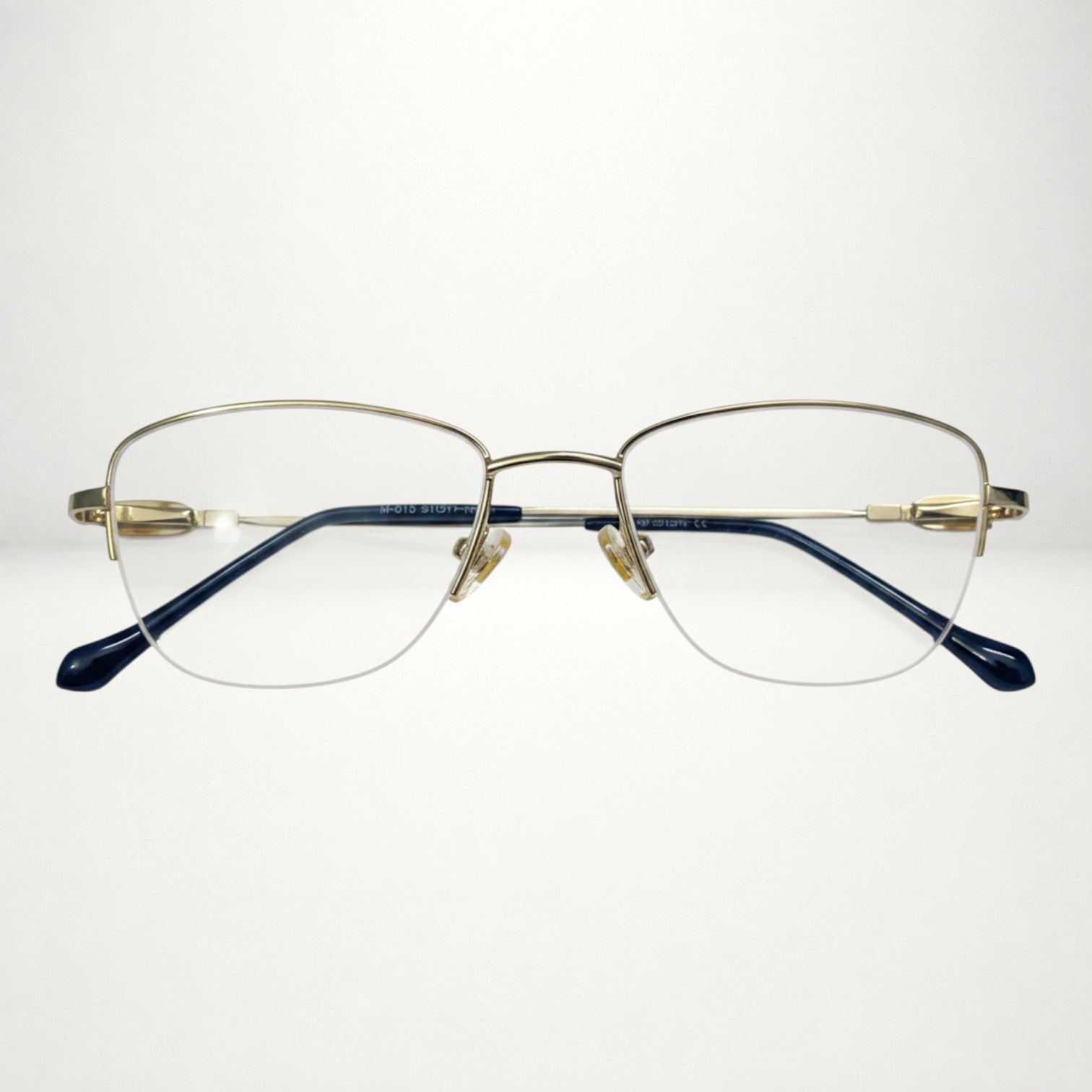 Elegant Rimless Rectangular Gold Frame – BLK-OF-0048